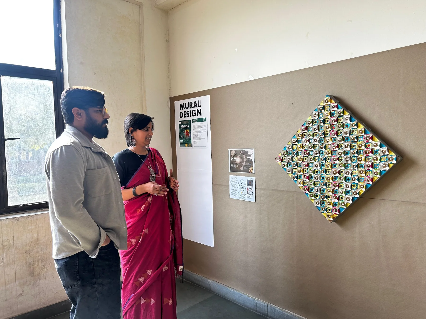 Design review at a mural design exhibition