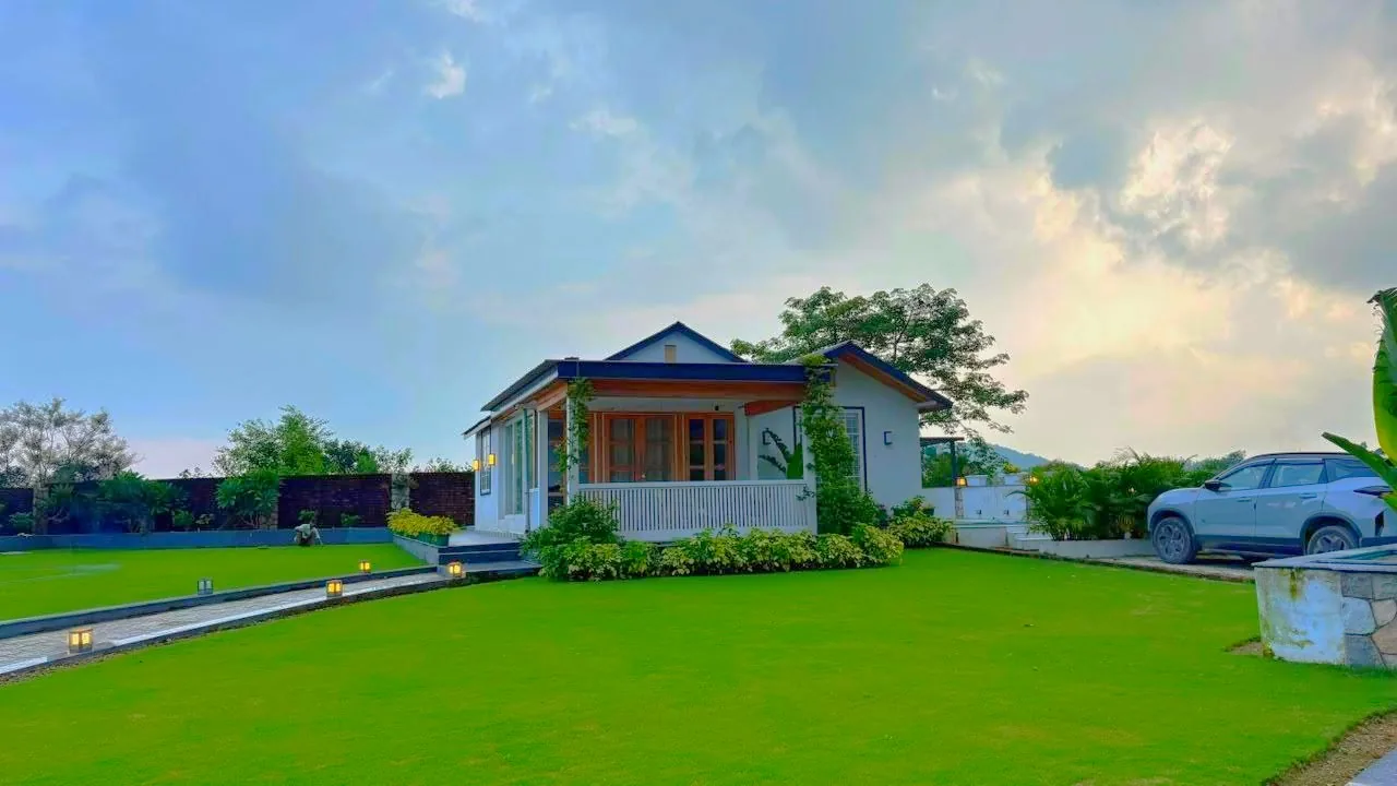 Wide lawn view at the Mussoorie residence